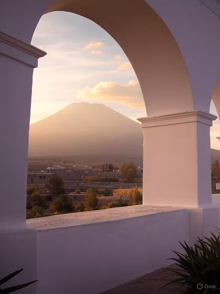 Yanahuara district viewpoint in Arequipa with colonial white arches framing panoramic view of Misti