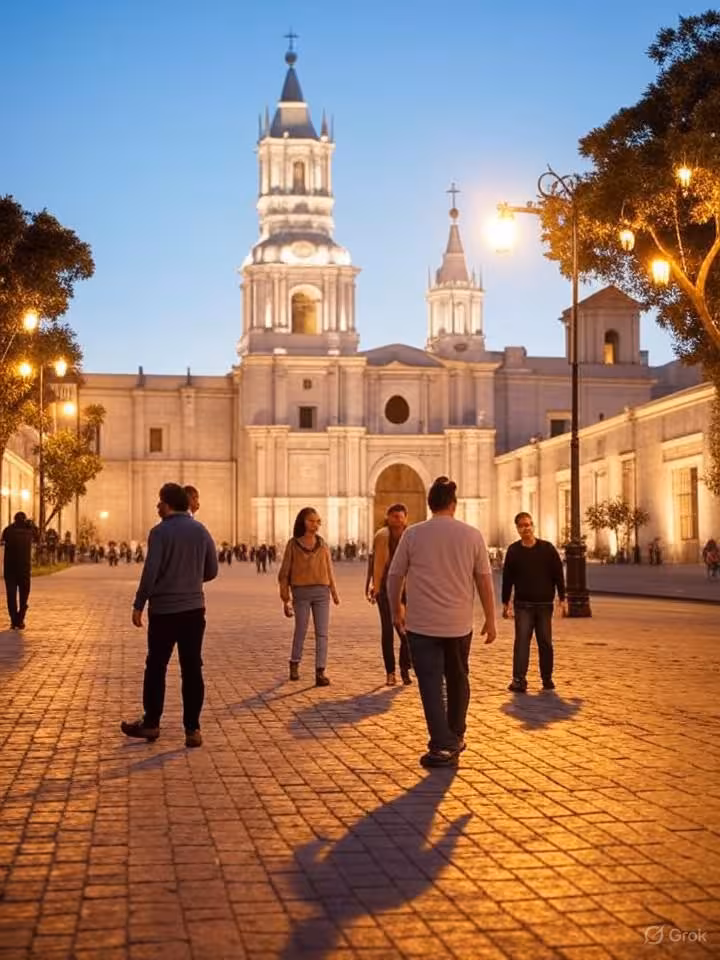 Traditional Arequipa plaza with cathedral and colonial portales, couples walking, evening blue hour