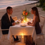 Los resorts all-inclusive más exclusivos de LATAM para sugar daddys Elegant couple dining at exclusive beachfront restaurant, candlelit table on the sand, ocean waves i