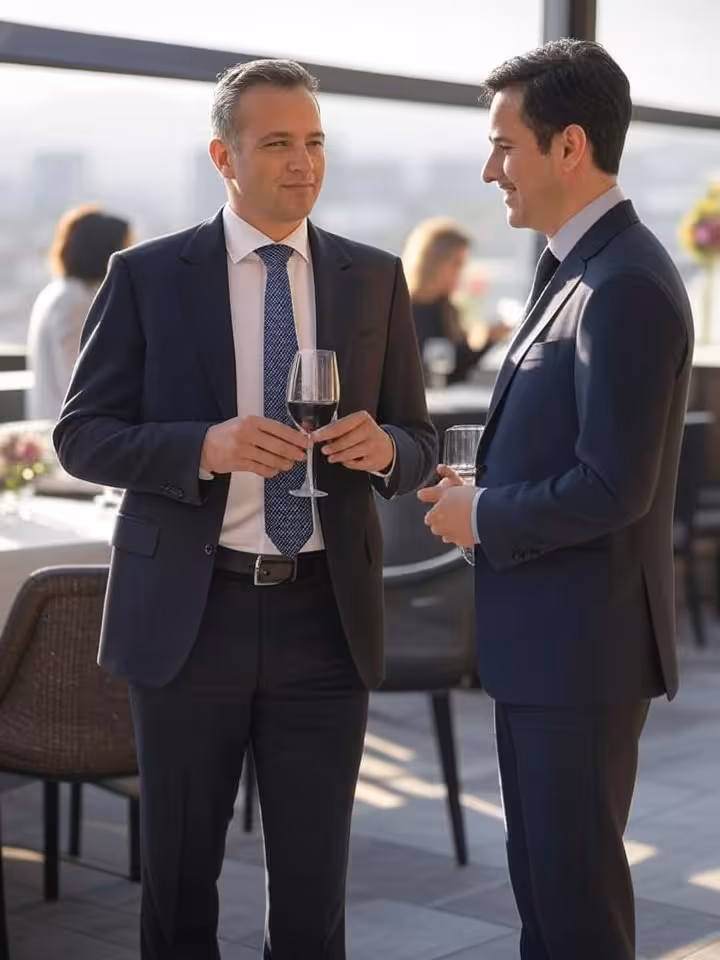 elegant mexican business professionals networking at upscale restaurant terrace in Queretaro, sophis