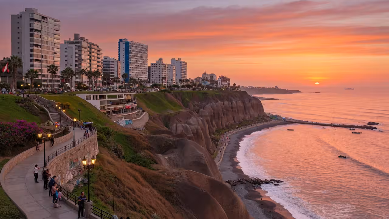 Lima Miraflores malecón coastal view, Pacific Ocean cliffs with modern buildings, Peruvian capital s
